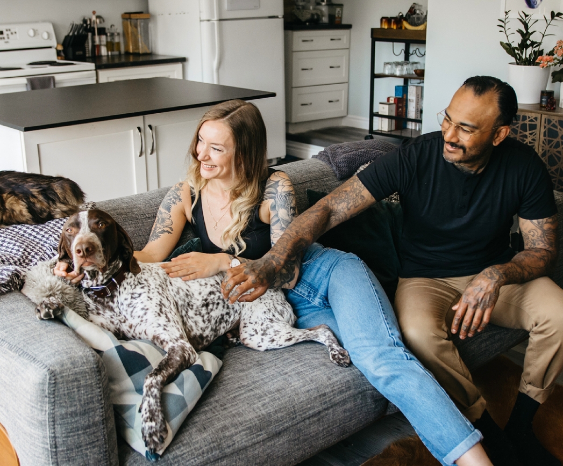 Nutram social media marketing: A family and their dog sitting on a couch